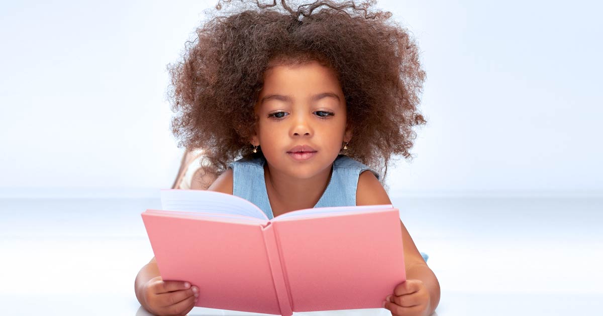 learning to read - girl with book