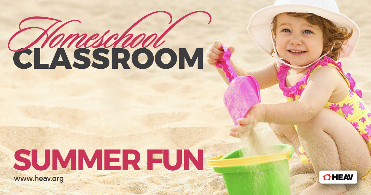 Homeschool classroom Summer Fun Ideas-toddler playing in sand at beach with pail and bucket
