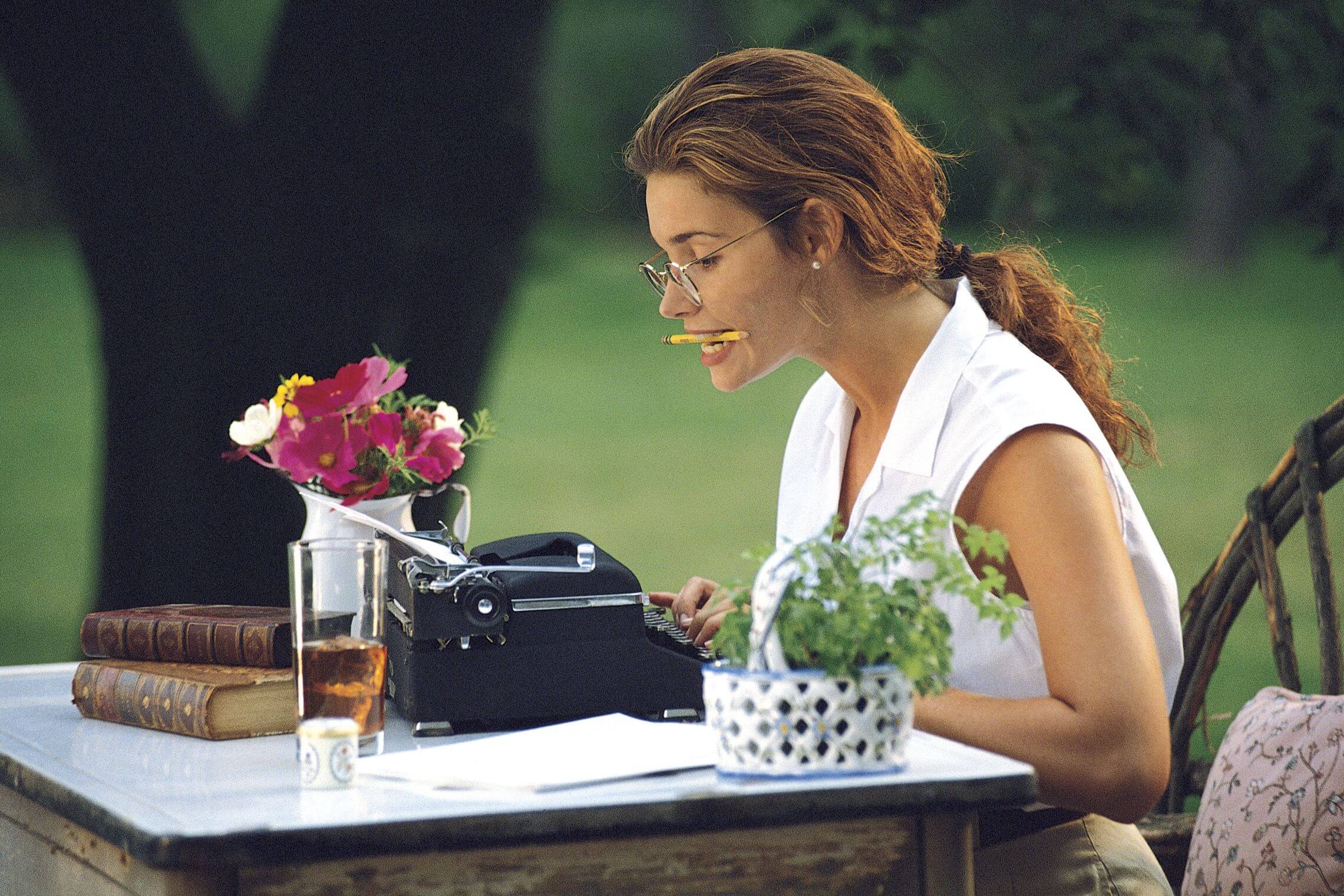 transcript woman typing at typewriter